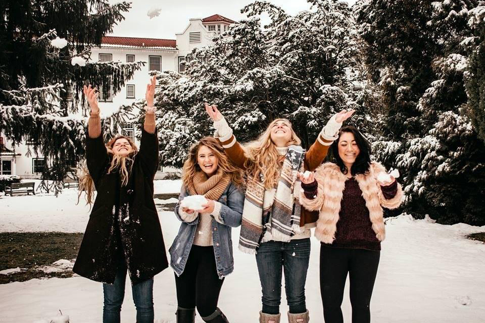 Friends having fun in the snow at Shawnee Inn in the Poconos.