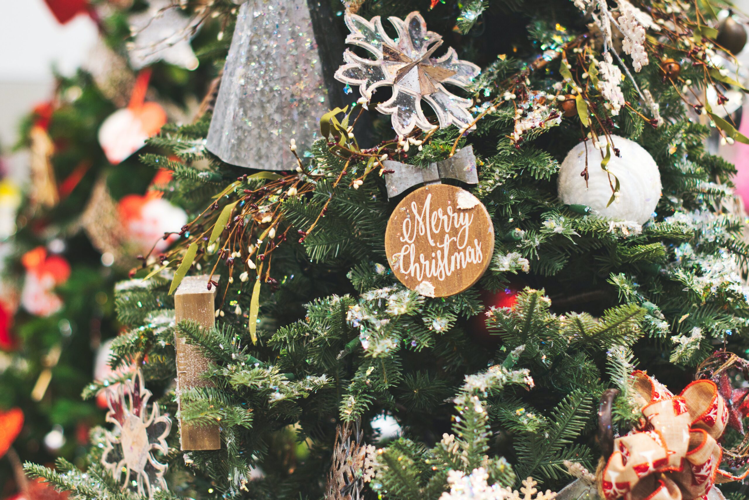 Christmas tree adorned with Christmas ornaments.