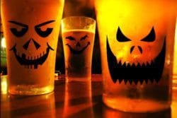 Jack-o-lanterns on beer pint glasses