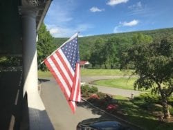 Flag on the Veranda overlooking the river