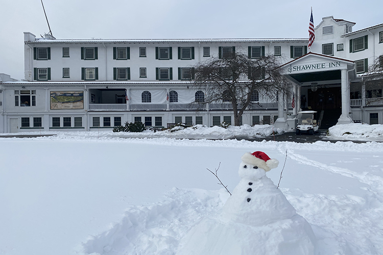 snowman in front of resort entrance